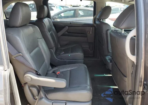 2012 Honda Odyssey Exl z USA, uszkodzony, nr VIN 5FNRL5H60CB031744